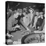 Playing the Roulette Wheel in a Las Vegas Club-Peter Stackpole-Stretched Canvas