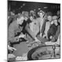 Playing the Roulette Wheel in a Las Vegas Club-Peter Stackpole-Mounted Photographic Print