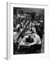 Playwright Paddy Chayefsky Sitting at Typewriter in Garment Factory With Workers on Sewing Machines-Michael Rougier-Framed Premium Photographic Print