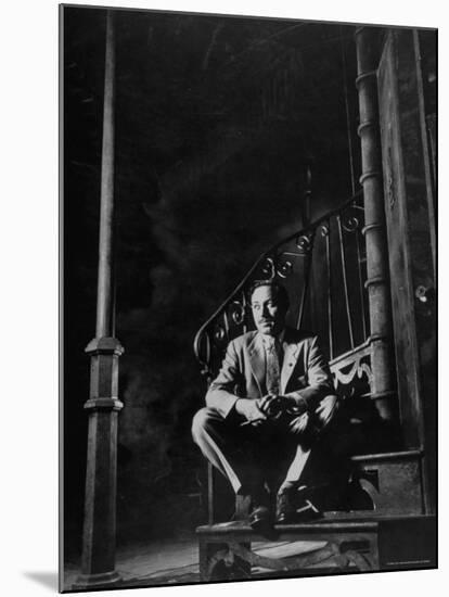 Playwright Tennessee Williams Sitting on Theater Set of His Play "Streetcar Named Desire"-Eliot Elisofon-Mounted Premium Photographic Print