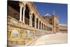 Plaza de Espana with ceramic tiled alcoves and arches, Maria Luisa Park, Seville, Spain-Neale Clark-Stretched Canvas