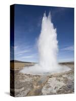 Plume of Water and Steam From the Strokkur Geysir Exploding Into the Air at Geysir Near Reykjavik-null-Stretched Canvas