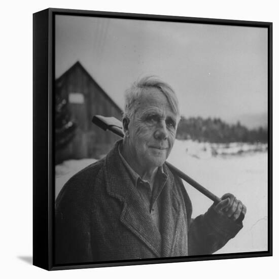Poet Robert Frost in Affable Portrait, Axe Slung over Shoulder in Wintry Rural Setting-Eric Schaal-Framed Stretched Canvas