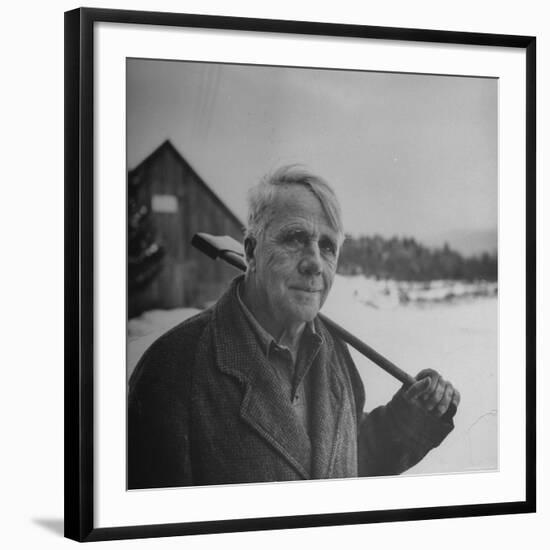 Poet Robert Frost in Affable Portrait, Axe Slung over Shoulder in Wintry Rural Setting-Eric Schaal-Framed Premium Photographic Print