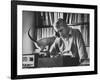 Poet Rod McKuen Playing Record on Stereo Set While Pet Siamese Cat Nuzzles His Face Affectionately-Ralph Crane-Framed Premium Photographic Print