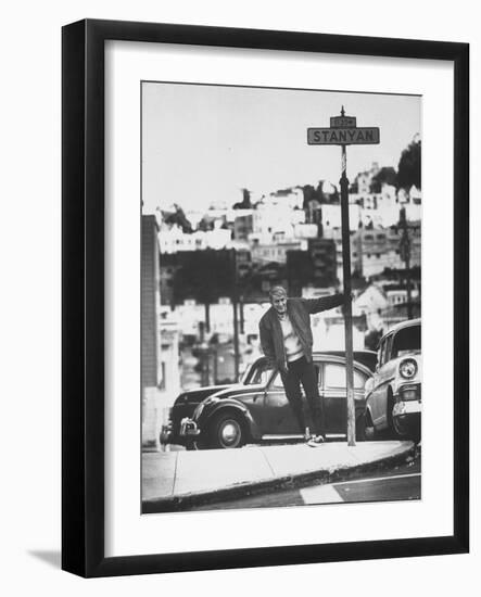 Poet Rod McKuen Swinging from Sign Which is Title of One His Songs, Stanyan Street-Ralph Crane-Framed Photographic Print