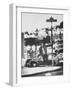 Poet Rod McKuen Swinging from Sign Which is Title of One His Songs, Stanyan Street-Ralph Crane-Framed Photographic Print