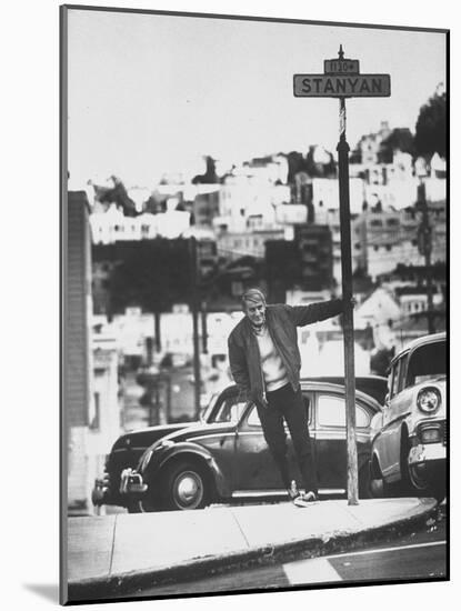 Poet Rod McKuen Swinging from Sign Which is Title of One His Songs, Stanyan Street-Ralph Crane-Mounted Photographic Print