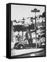 Poet Rod McKuen Swinging from Sign Which is Title of One His Songs, Stanyan Street-Ralph Crane-Framed Stretched Canvas