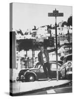 Poet Rod McKuen Swinging from Sign Which is Title of One His Songs, Stanyan Street-Ralph Crane-Stretched Canvas