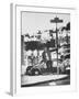 Poet Rod McKuen Swinging from Sign Which is Title of One His Songs, Stanyan Street-Ralph Crane-Framed Photographic Print