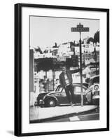 Poet Rod McKuen Swinging from Sign Which is Title of One His Songs, Stanyan Street-Ralph Crane-Framed Photographic Print