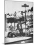 Poet Rod McKuen Swinging from Sign Which is Title of One His Songs, Stanyan Street-Ralph Crane-Mounted Photographic Print