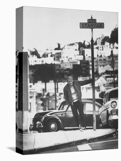 Poet Rod McKuen Swinging from Sign Which is Title of One His Songs, Stanyan Street-Ralph Crane-Stretched Canvas