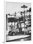 Poet Rod McKuen Swinging from Sign Which is Title of One His Songs, Stanyan Street-Ralph Crane-Framed Photographic Print