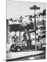 Poet Rod McKuen Swinging from Sign Which is Title of One His Songs, Stanyan Street-Ralph Crane-Mounted Photographic Print