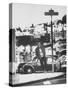 Poet Rod McKuen Swinging from Sign Which is Title of One His Songs, Stanyan Street-Ralph Crane-Stretched Canvas