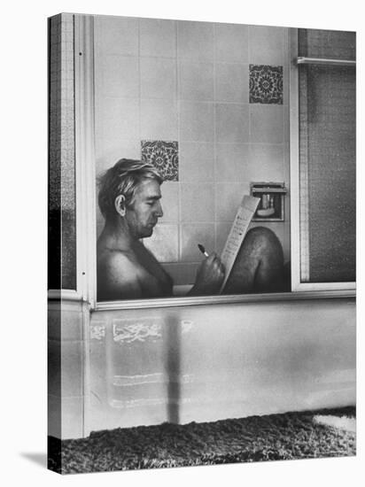 Poet Rod McKuen Writing Song Lyrics in His Bathtub, at Home-Ralph Crane-Stretched Canvas