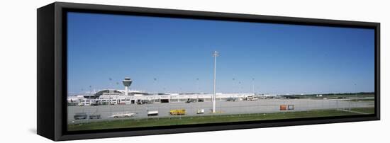 Pole and Vehicle Trailers at an Airport, Munich Airport, Munich, Bavaria, Germany-null-Framed Stretched Canvas