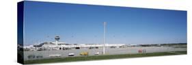 Pole and Vehicle Trailers at an Airport, Munich Airport, Munich, Bavaria, Germany-null-Stretched Canvas