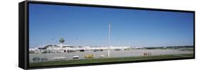 Pole and Vehicle Trailers at an Airport, Munich Airport, Munich, Bavaria, Germany-null-Framed Stretched Canvas
