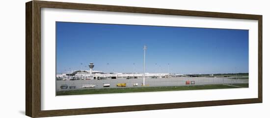 Pole and Vehicle Trailers at an Airport, Munich Airport, Munich, Bavaria, Germany-null-Framed Photographic Print