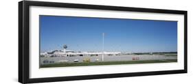 Pole and Vehicle Trailers at an Airport, Munich Airport, Munich, Bavaria, Germany-null-Framed Photographic Print