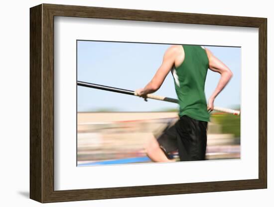 Pole Vaulter Running down the Runway (Motion Blur)-soupstock-Framed Photographic Print