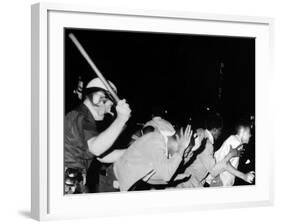 Police Club Demonstrators in Harlem on July 20, 1964-null-Framed Photo