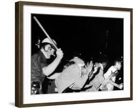 Police Club Demonstrators in Harlem on July 20, 1964-null-Framed Photo