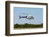 Police Helicopter Flying above a Tree Line on a Sunny Day-icholakov-Framed Photographic Print