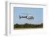 Police Helicopter Flying above a Tree Line on a Sunny Day-icholakov-Framed Photographic Print