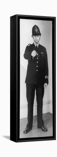 Police Officer in Uniform Pointing-null-Framed Stretched Canvas