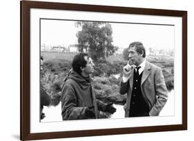 POLICE PYTHON, 1976 directed by ALAIN CORNEAU On the set, Alain Corneau directs Yves Montand (b/w p-null-Framed Photo