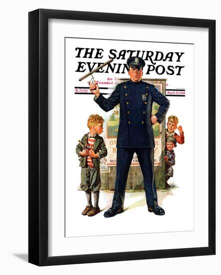 "Policeman and Boy with Slingshot," Saturday Evening Post Cover, March 15, 1930-Frederic Stanley-Framed Premium Giclee Print