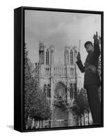 Policeman Directing Traffic in Front of the Reims Cathedral-Nat Farbman-Framed Stretched Canvas