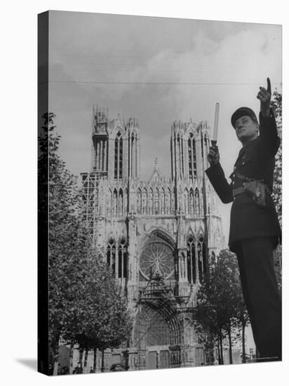 Policeman Directing Traffic in Front of the Reims Cathedral-Nat Farbman-Stretched Canvas