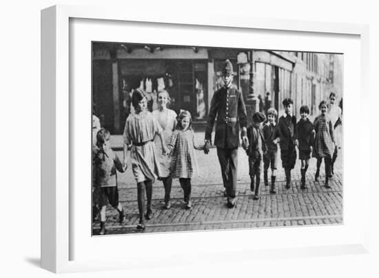 Policeman Helping Schoolchildren across the Road, East End, London, 1926-1927-null-Framed Giclee Print