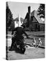 Policeman on Motorcycle Chatting with Toddler Boys Sitting on Curb-Alfred Eisenstaedt-Stretched Canvas