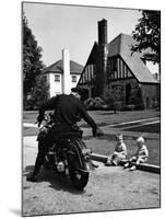 Policeman on Motorcycle Chatting with Toddler Boys Sitting on Curb-Alfred Eisenstaedt-Mounted Photographic Print