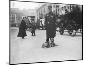 Policeman with Dog-null-Mounted Photographic Print