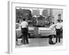 Policemen Watch as 'Freedom Riders' Arrive in Jackson, Mississippi, May 24, 1961-null-Framed Photo