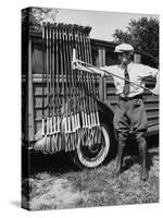 Polo Player Checking the Mallets-Alfred Eisenstaedt-Stretched Canvas