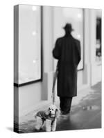 Poodle with Man, Lucerne, Switzerland-Walter Bibikow-Stretched Canvas