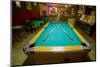 Pool table lit by electric lights in a restaurant and bar in Shoshone, CA near Death Valley Nati...-null-Mounted Premium Photographic Print