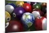 Pool Table with Balls and One of Them as Planet Earth-null-Mounted Art Print