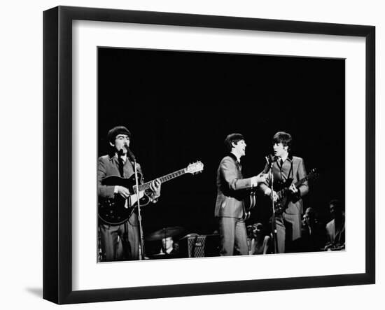 Pop Music Group the Beatles in Concert George Harrison, Paul McCartney, John Lennon-Ralph Morse-Framed Premium Photographic Print