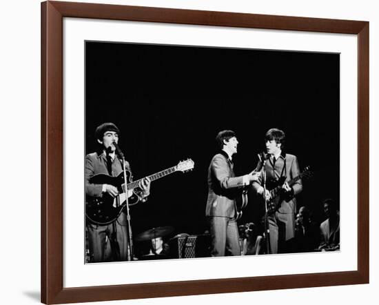 Pop Music Group the Beatles in Concert George Harrison, Paul McCartney, John Lennon-Ralph Morse-Framed Premium Photographic Print