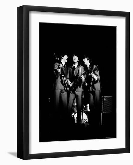 Pop Music Group the Beatles in Concert Paul McCartney, John Lennon, George Harrison-Ralph Morse-Framed Premium Photographic Print