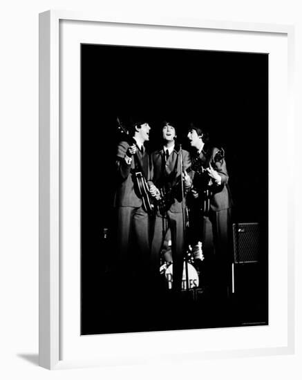 Pop Music Group the Beatles in Concert Paul McCartney, John Lennon, George Harrison-Ralph Morse-Framed Premium Photographic Print